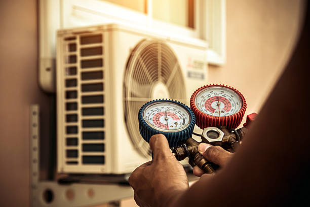 Professional Heat Pump Repair technician working in Moscow, OH